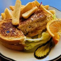 Tuna Melt Sandwich · Grilled sourdough bread, lettuce, tomato and American cheese.