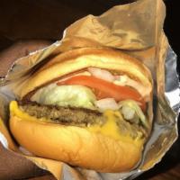 The Impossible Burger · 100% Plant-based and 100% delicious. Includes cheese, grilled onions, mustard, ketchup, and ...