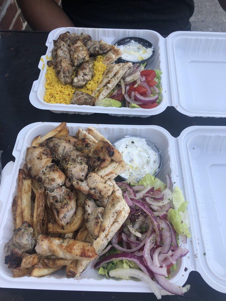 Chicken Souvlaki Platter · 2 sticks of our hand skewered chicken souvlaki over our handcut fries or yellow rice. Comes with a side salad and your choice of bread, sauce, and toppings. 
