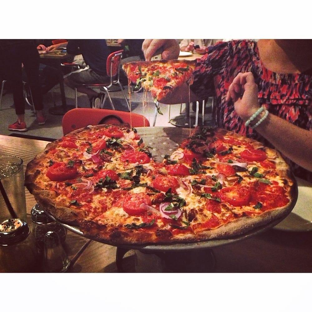 Tucci's Fire N Coal Pizza · Pizza · Italian · Chicken Wings