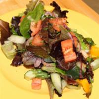 Fattoush Salad · Mixed green salad with tomatoes, cucumbers, red onion, radishes, fresh squeezed lemon juice,...
