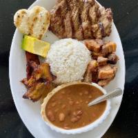Carne Asada · Grilled beef steak. With rice, salad, and sweet plantains.
