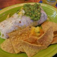 Brazilian Beef Burrito · Fresh beef grilled with onions, garlic and spicy chipotle sauce with rice, beans, guacamole ...