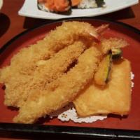 Shrimp Tempura · 4 pieces shrimp tempura and 4 pieces veggie tempura. Battered and fried. 