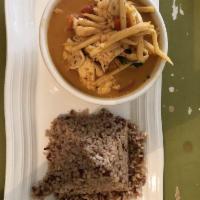 Red Curry · Classic Thai red curry paste, bamboo shoots, basil and bell peppers in coconut milk. Spicy m...