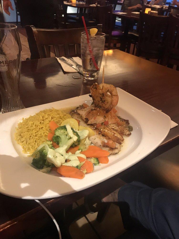 Seafood Combination Plate · Grilled king salmon fillet, shrimp kabob and grilled tilapia topped with our lemon caper sauce served with rice and veggies.