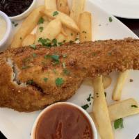 Crispy Fish and Chips · Lightly beer battered fresh cod fish served with tartar sauce and french fries.
