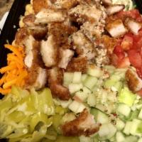 BBQ Chicken Chop Salad · Chopped lettuce, BBQ chicken, cilantro, cucumbers, tomatoes, smoked mozzarella, wontons, cri...