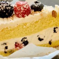 Gateau Triple Berry · Sponge cake, blackberry, blueberry, raspberry, whipped cream and almond.
