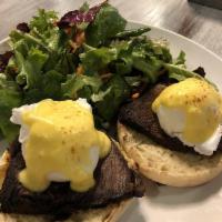 Amandine Eggs Benedict · On homemade biscuit with braised short rib, poached eggs, Hollandaise with baby mixed greens.