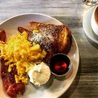 Breakfast Combo · 2 eggs any style, 2 strips of bacon or 2 turkey sausage served with 1/2 order of french toast.