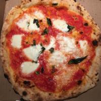 Margherita Pizza · Tomato sauce, homemade mozzarella and fresh basil. Contains extra virgin olive oil. Add fres...