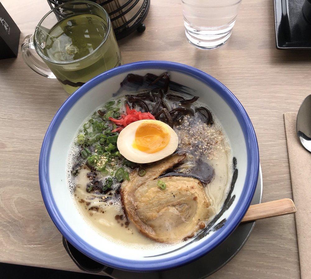 Tonkotsu Shio Ramen · GFO. Shio tare, pork broth, chashu, pork, egg, black garlic oil, green onion, pickled ginger, kikurage mushroom, sesame.