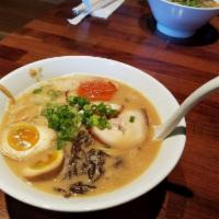 Tonkotsu Ramen · Creamy pork broth and thin noodles.