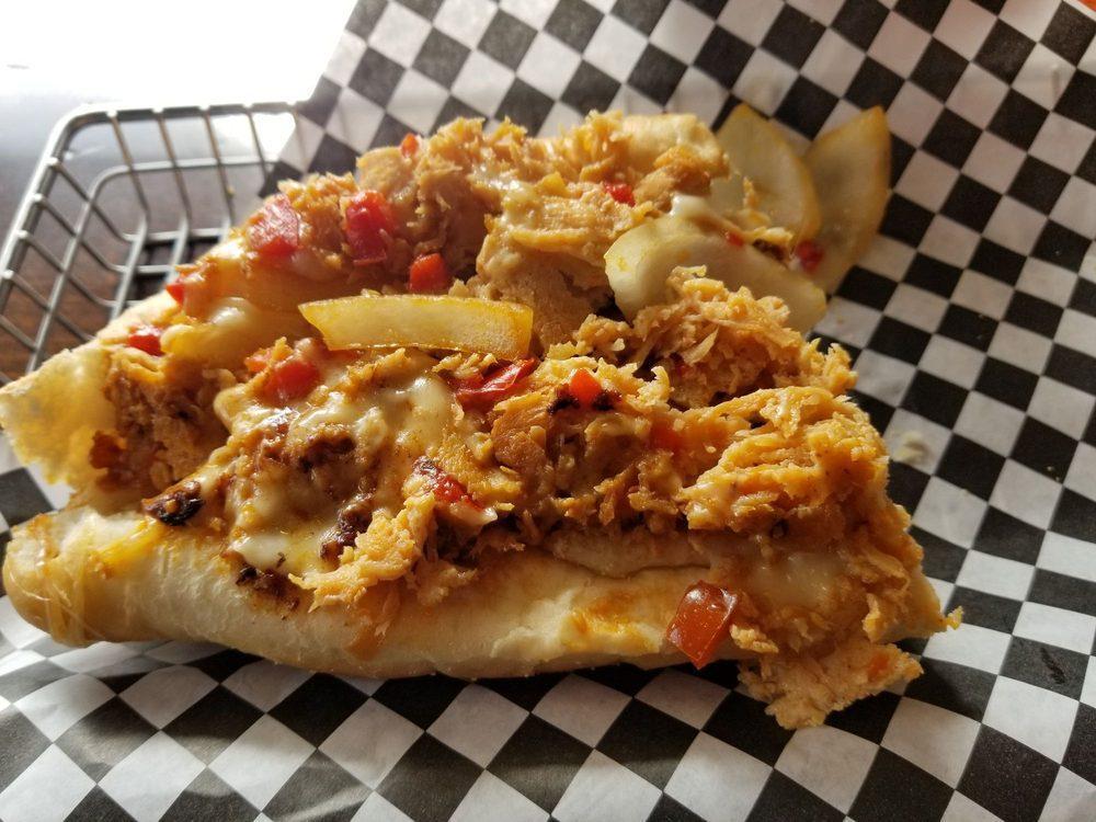 Philly Buffalo Cheesesteak · Steak or chicken, grilled onions, sweet peppers, tomatoes, Buffalo sauce and your choice of cheese.