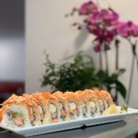Monster Roll · Crab stick, avocado, and cream cheese I/O topped with imitation crabmeat salad.