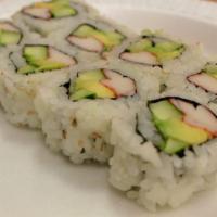 California Roll · Eight pieces. Crab stick, avocado and cucumber.