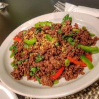 Thai Spicy Basil · Choice of ground meat, red bell pepper, chopped green bean, onion, garlic and basil leaves.