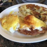 Eggs Benedict · 2 extra large poached eggs with dearborn ham on an English muffin topped with hollandaise sa...
