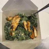 Kale Caesar Salad · Parmesan, croutons and anchovy Caesar dressing.