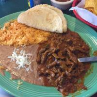 Chile Colorado · Red pepper, steak with sauce, rice and beans.