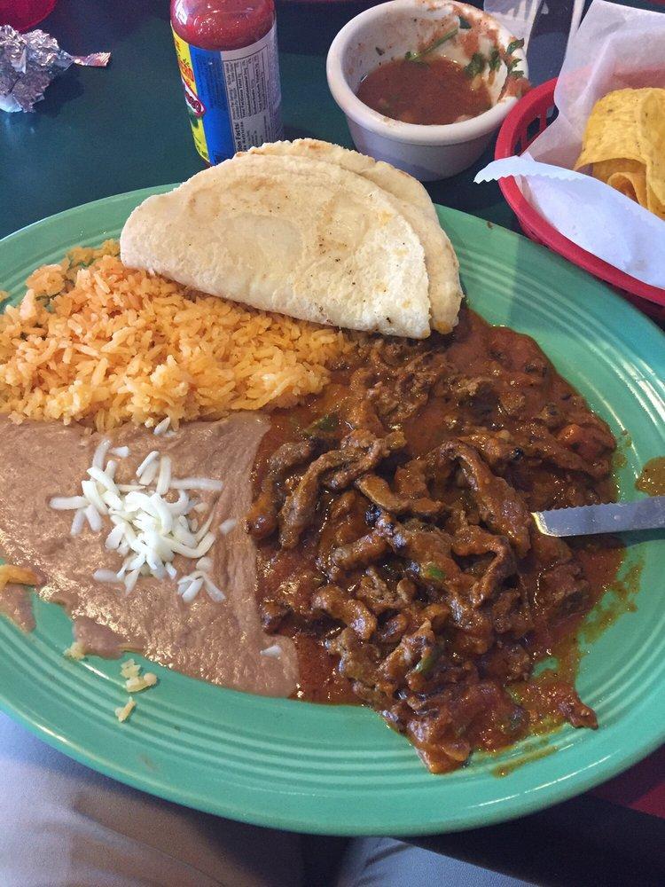 Chile Colorado · Red pepper, steak with sauce, rice and beans.
