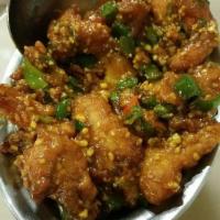 Chicken 65 · Tender chunks of boneless chicken cubes sautéed to perfection with onions, ginger, chili, an...