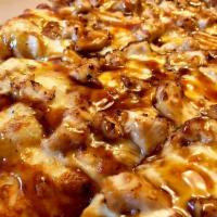 Cima Coppa Pizza · Teriyaki chicken, garlic ranch sauce, and teriyaki glaze. Mozzarella and provolone cheese bl...