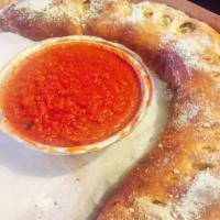 Stromboli · Pepperoni, sausage and mozzarella.