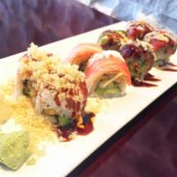 Red Carpet Roll · Raw. 2 pieces each of mama san, sun buster, tempura dragon and crunch roll.