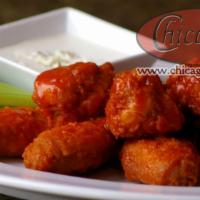 Boneless Buffalo Wings · Delicious boneless wings a touch of buffalo sauce.S erved with Ranch or Blue Cheese Dressing.