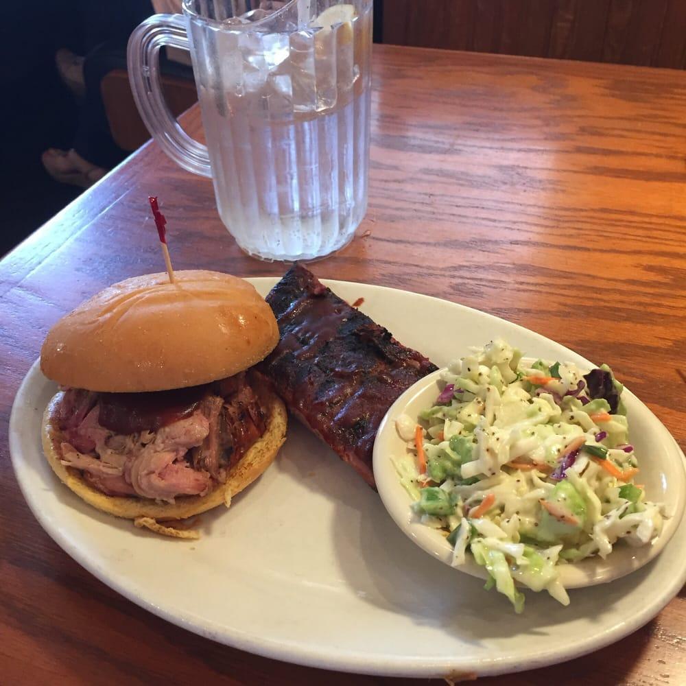 Pulled Pork Sandwich · Hickory-smoked and hand-pulled with a side of Mojo Mild sauce. Served with one Southern Side.  Like your sandwich topped with Cole Slaw? ...ask for Memphis-style.