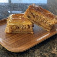 Baklava · Flaky puff pastry filled with walnuts and meringue, soaked in local organic honey