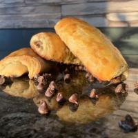 Chocolate Croissant · house-made croissant dough filled with rich chocolate 