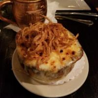 French Onion Soup · Melted Swiss, provolone cheese and toasted crouton.