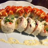 Red Dragon Roll · Tempura shrimp, avocado, topped with spicy tuna, spicy mayo and tobiko.