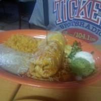 Chimichanga · Taco meat, chicken, or pork with cheese and beans rolled in a large flour tortilla and fried...
