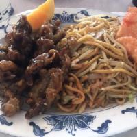 Manchurian Beef · Tender beef slices dipped in a light batter and deep-fried, then sauteed in a delicious swee...