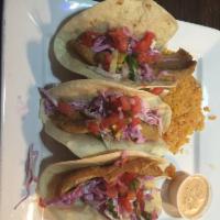 Fish Tacos · 3 pieces tilapia tacos, beer-battered, and fried. Topped with Mexican coleslaw, pico de gall...