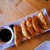 Gyoza · Pork and veggies dumpling, deep fried served with sweet soy sauce