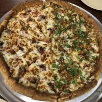 Chicken Tikka Masala Pizza · This pizza has our signature tikka masala sauce, All-Natural Tikka Masala Chicken Breast, fr...