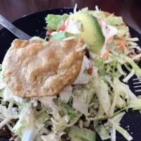 Gorditas · Handmade stuffed thick tortillas with choice of meat. Include beans, lettuce, tomatoes, chee...