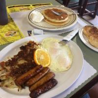 Big Breakfast Plate · 3 eggs, 2 bacon, 2 sausage, hashbrown, toast and 2 pancakes.