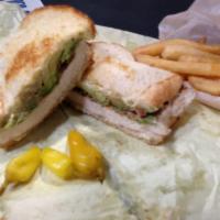 Chicken Melt · Grilled sourdough bread with swiss cheese, grilled chicken breast, bacon and avocado