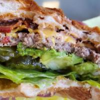 Alea Burger · 1/3lb beef patty, Avocado, bacon, cheese, lettuce, tomato, onions, pickles and 1000 island d...