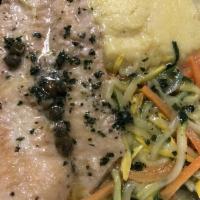 Sole Meuniere · Sauteed in a lemon caper sauce with mashed potatoes and julienne vegetables.