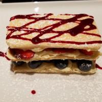 Napoleon · Puff pastry with mascarpone cheese and fresh fruit.