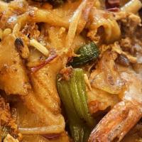 Char Kway Teow · A classic Penang hawker dish; Wok-fried rice noodles, Chinese sausage, shrimp, egg ＆ beanspr...