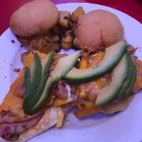 Breakfast Sliders · 2 fried-hard eggs, cheddar cheese, shaved ham and fresh avocado served on fresh baked rolls ...