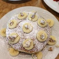 Banana Walnut Waffle · Powdered sugar and whipped cream.